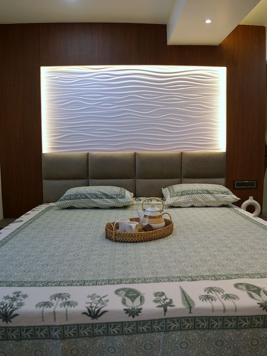 Classic Room head-on, the bed made up in a block-printed spread