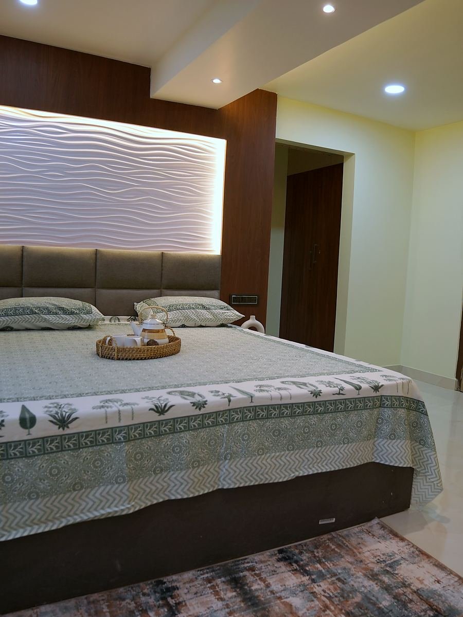 Classic Room from the side, the full length of the headboard wall in frame